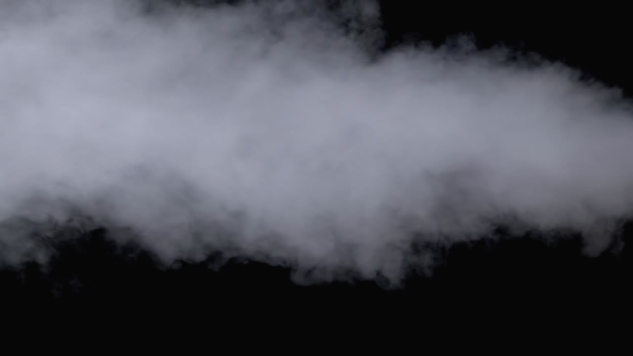 색 수증기 - 검은색 배경에 증기 증기의 제트 - 느린 모션