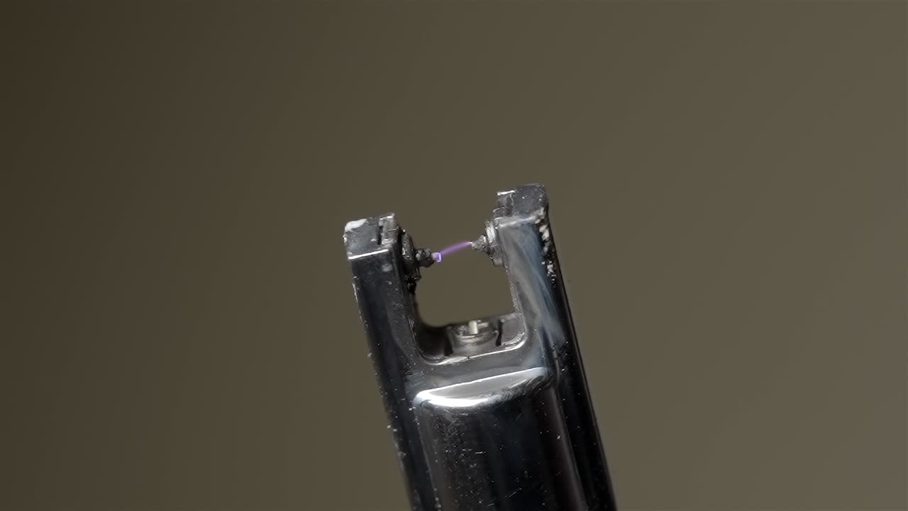 Electric Arc Lighter Sparking in Slow Motion - Close Up (240fps)