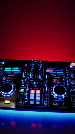 dj controller in vibrant lighting