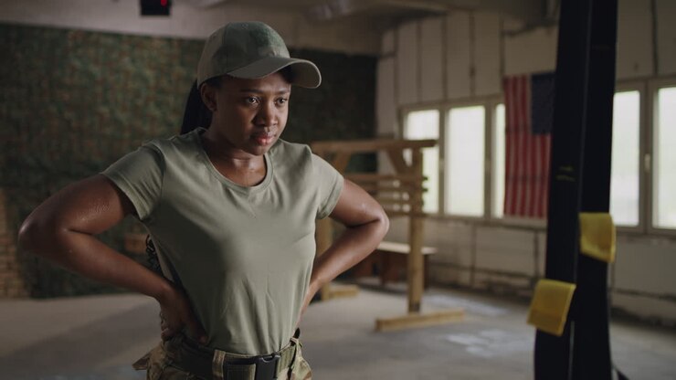 Military Woman Exercising in Gym
