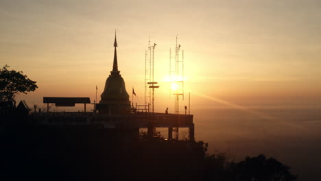 sunrise over a mountaintop temple