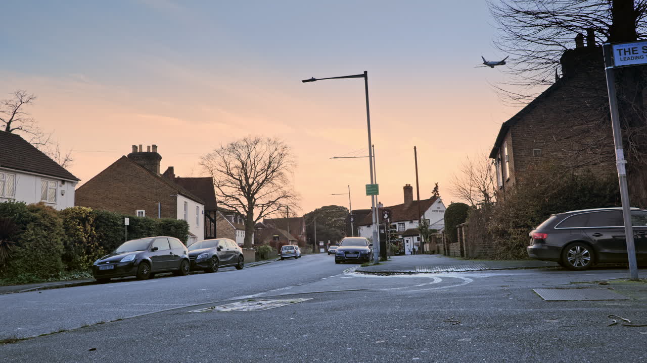Low angle slider shot of Longford Village, at sunset. This entire area is due for demolition following the start of Heathrow's expansion plan.