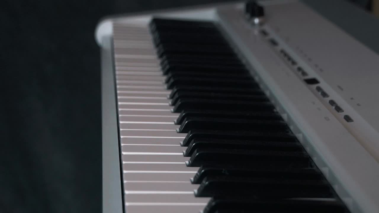 Close-up of a White Digital Piano Keyboard