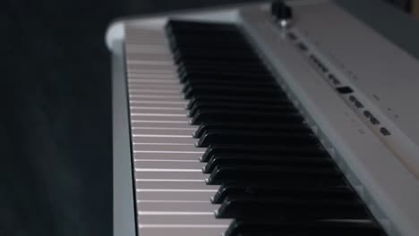 close-up of a white digital piano keyboard