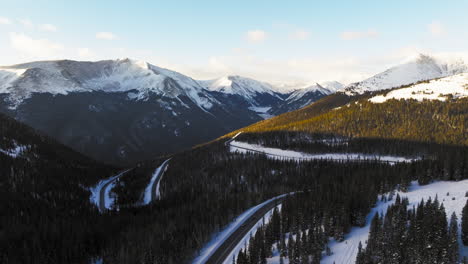 aerial views of winding roads in the colorado rocky mountains