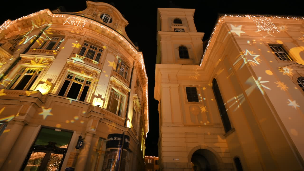 View of the Historic Centre of Sibiu with Christmas fair. Old buildings decorated with illumination