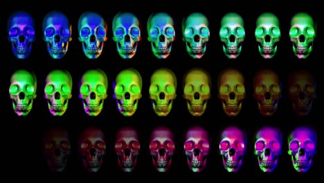 animation of human skulls, blinking in different colors horizontally in three rows, colorful presentation, dark background good for blending with alpha matte option