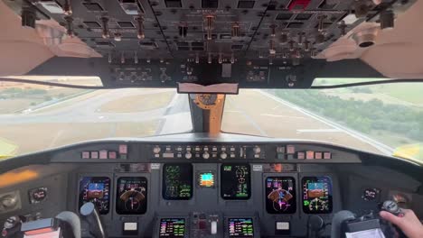Pilots-approaching-landing-at-the-airport,-real-time-cabin-dashboard-view