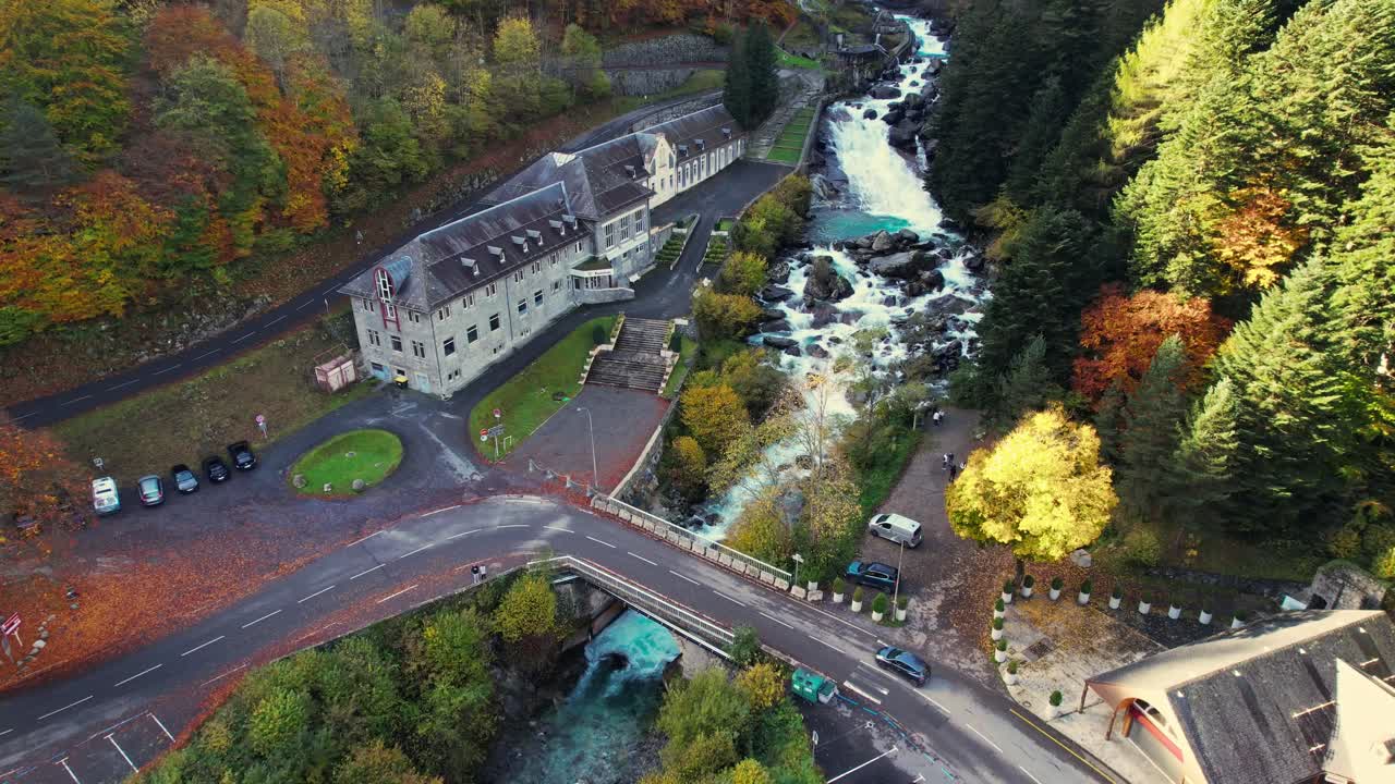 Aerial view of spa by waterfall in scenic Pyrenees, France