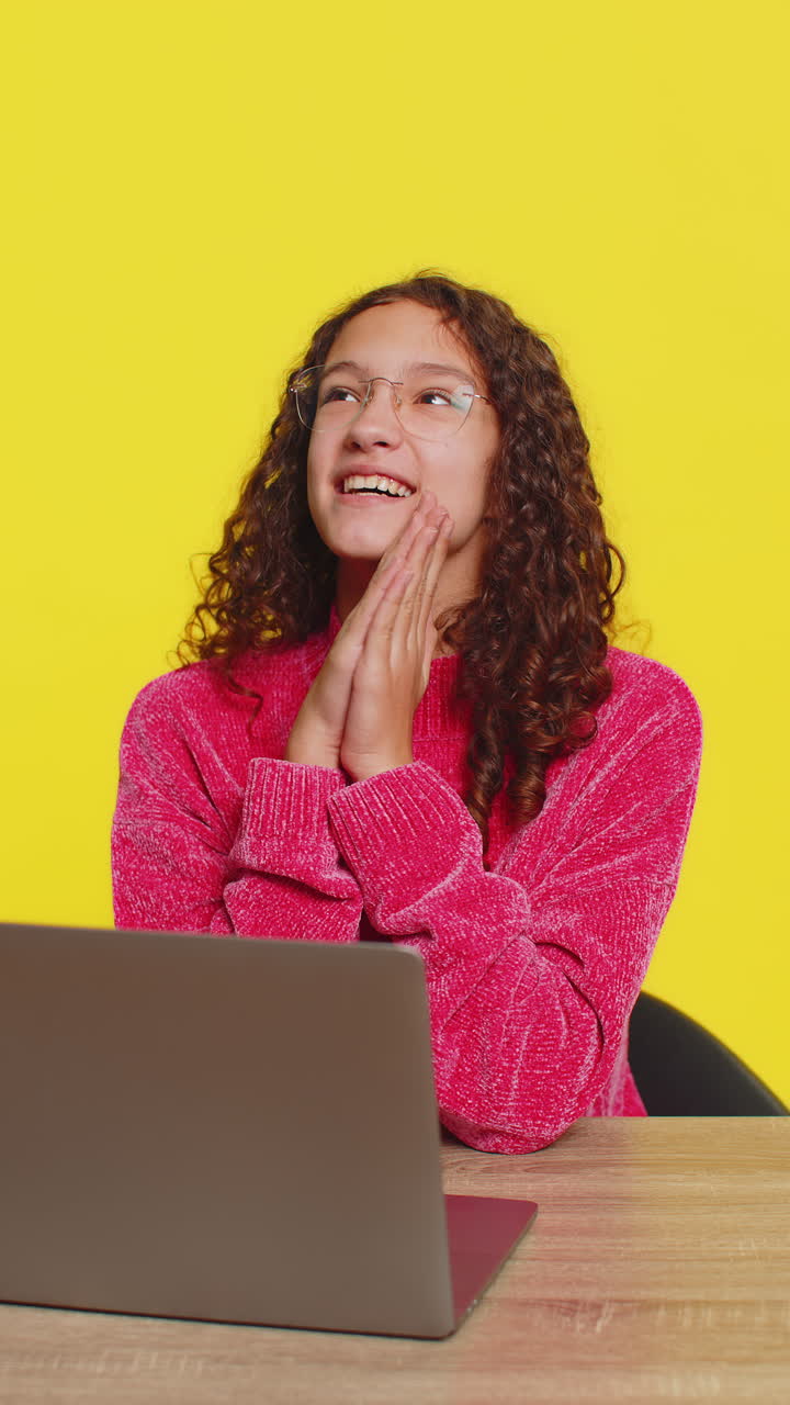 Happy girl working on laptop shocked by victory celebrate winning goal achievement good career news