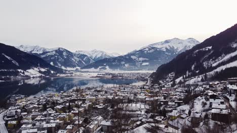 establishing shot of zell am see townscape in winter, covered with snow, day