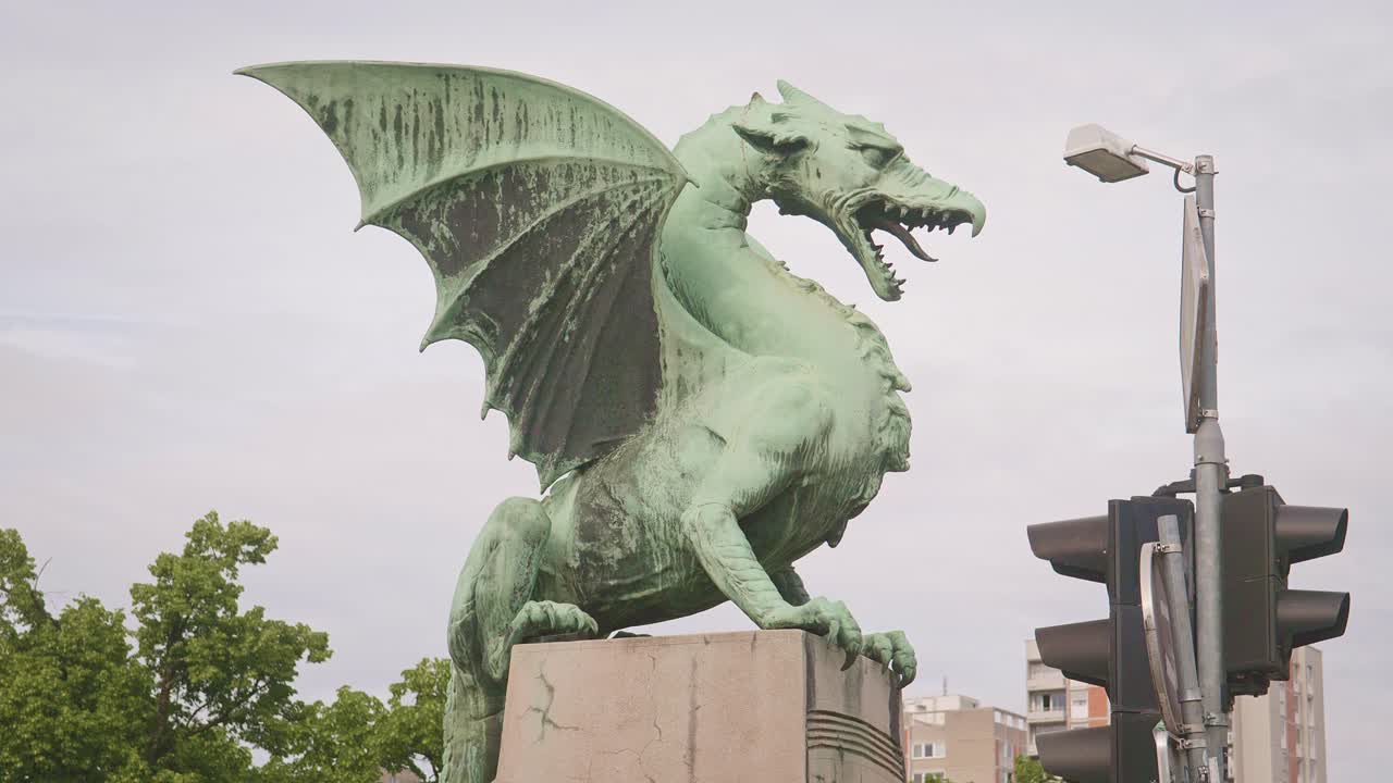 Ljubljana Winged dragon bronze statue on road bridge city landmark