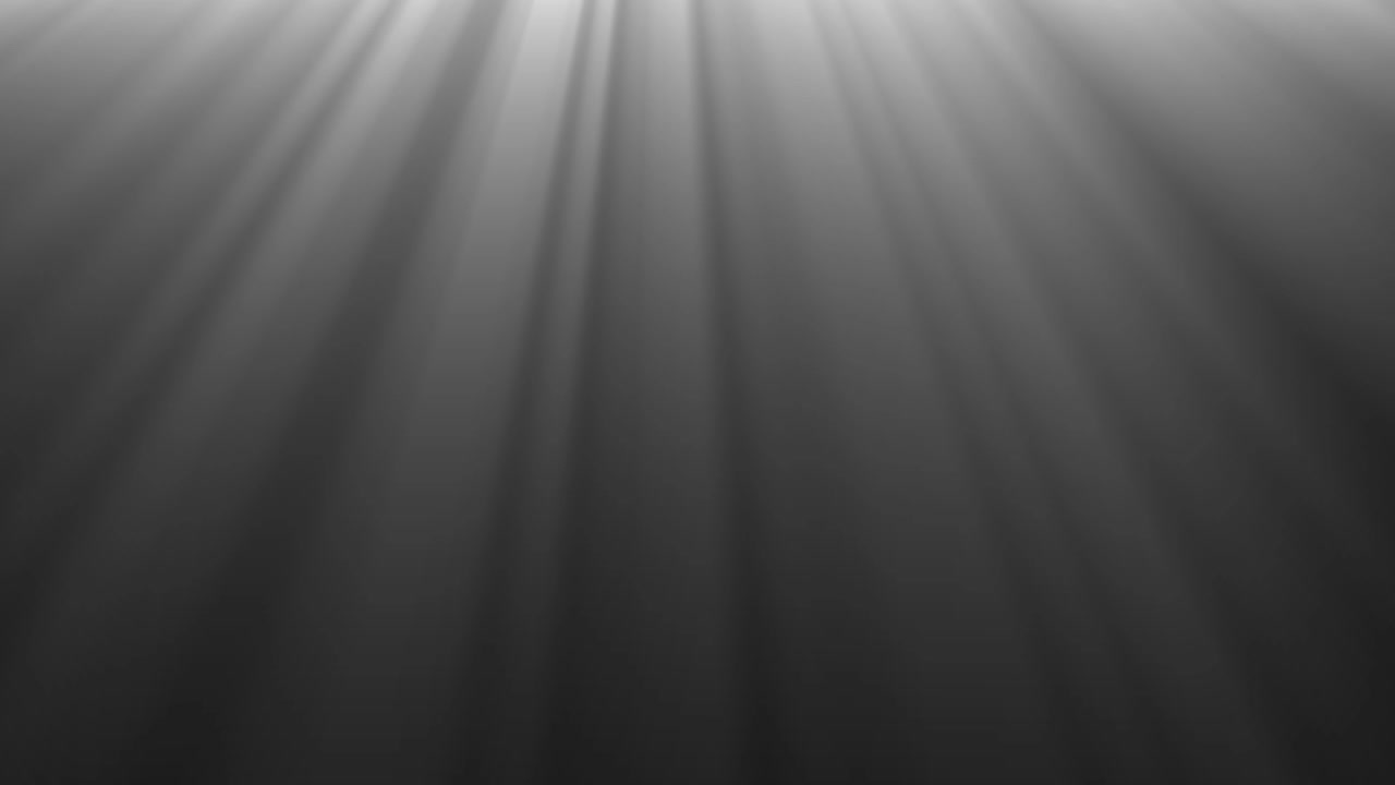 Volumetric Light Rays Shining Down on a Dark Background