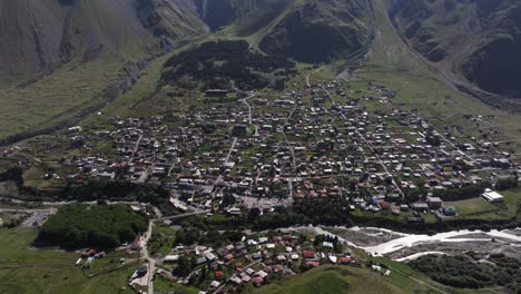 birds eye view high above stepantsminda village, georgia