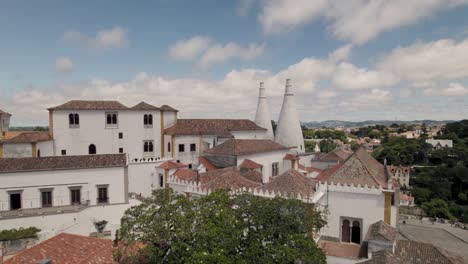 Cinematic-panning-shot-of-medieval-royal-residence,-well-preserved-town-palace-of-Sintra-in-Lisbon