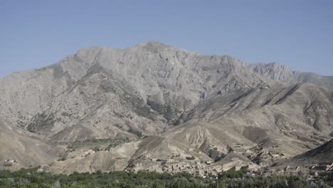 Steep-mountain-range-of-Panshir-valley-in-Afghanistan,-handheld-view