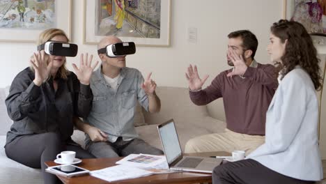 surprised mature people experiencing vr glasses