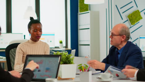 woman boss leader discussing new project using paperwork