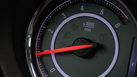 the rpm red arrow shows the number of revolutions per minute of the engine