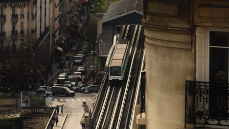 metro station and bustling street at daytime in paris, france