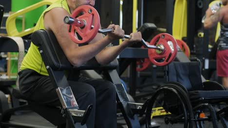 man with disabilities training in the gym of rehabilitation center