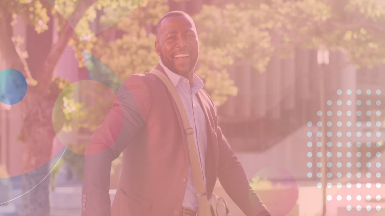 Animation of shapes over smiling african american man with bicycle