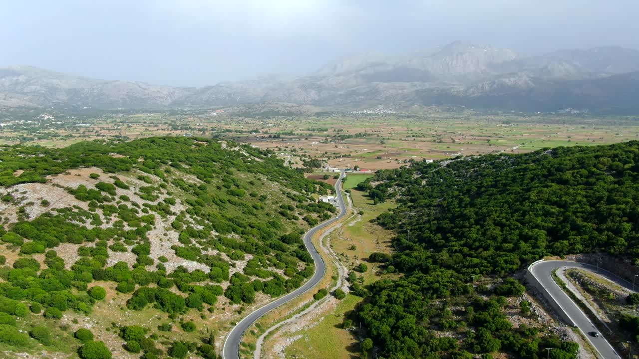 Aerial Over Winding Curvy Rural Road In Crete