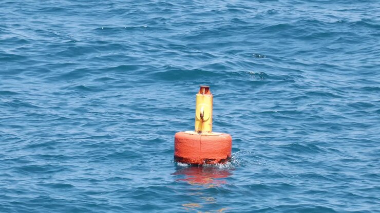 A buoy floating in the ocean waves