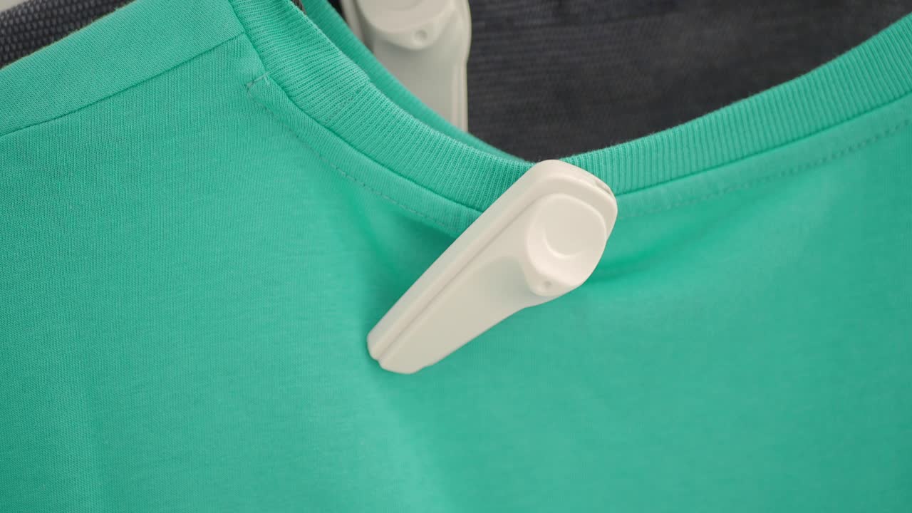 Security tag attached to clothing