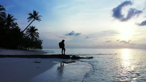 silhouette of a tourist enjoying the beauty of the pristine nature