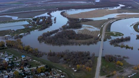 aerial shot of the red river flooding in fall near morris manitoba as a result of freak winter storm