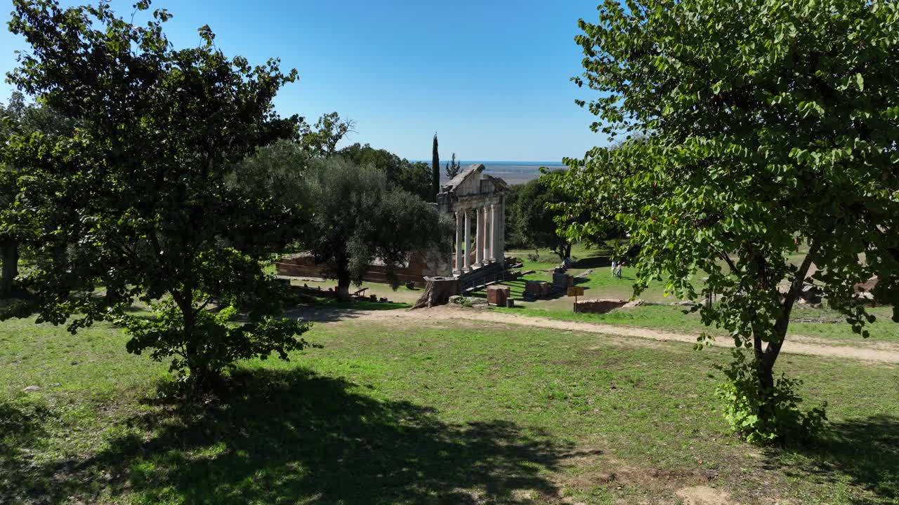 Experience a POV walk through Apollonia's nature and ancient ruins, uncovering history.