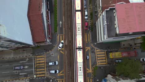 Urban-city-landscape-train-run-on-Railroad-track,-skyscrapers