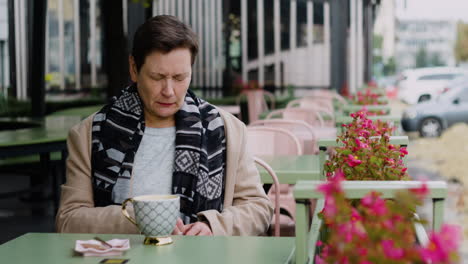 woman sitting at the café