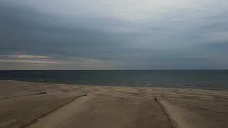 pa of the coastline of lake michigan in late winter after snow melt