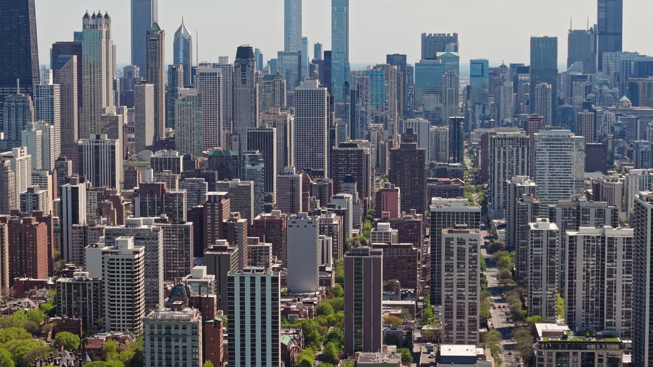 Aerial View of Chicago Downtown Residential and Office Towers and Buildings on Sunny Summer Day