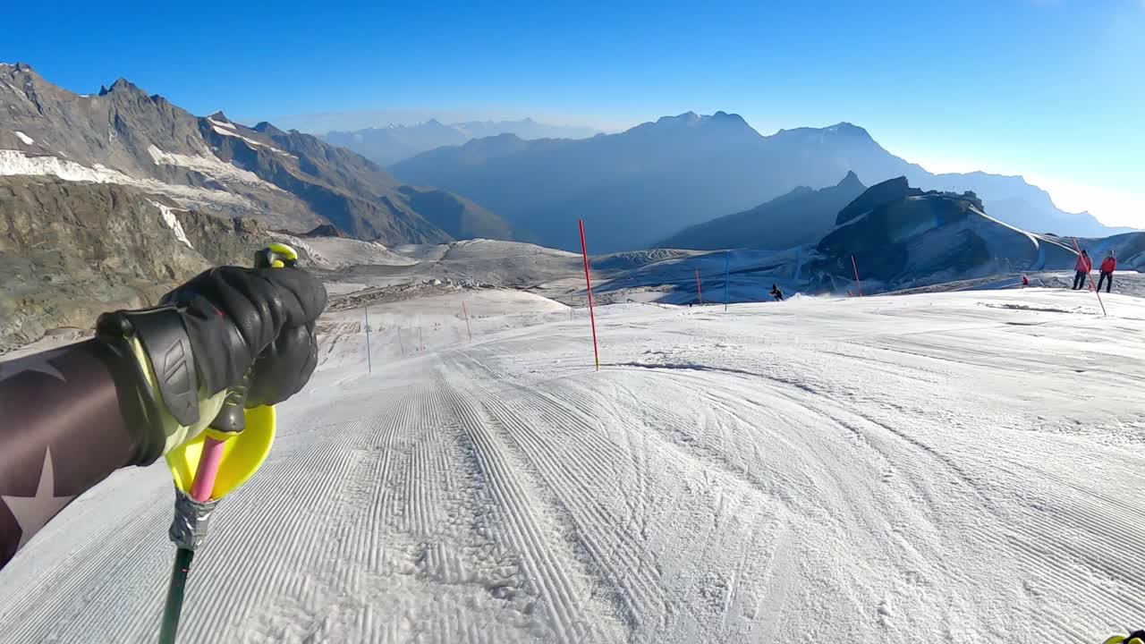 Skiing down a glacier in the Alps