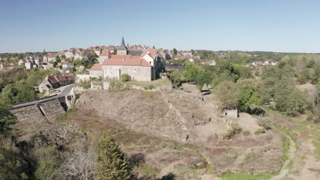 aerial drone point of view of the town of saint-benoit-du-sault in indre, france