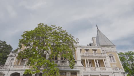 historic palace with lush trees