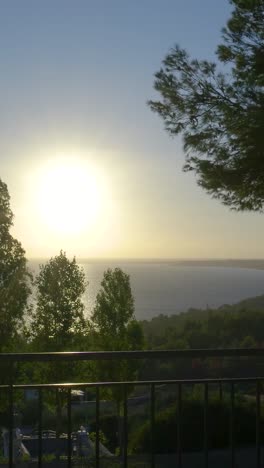 sunset view over lake from balcony