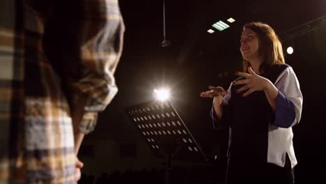 Teenagers-rehearsing-in-a-theatre