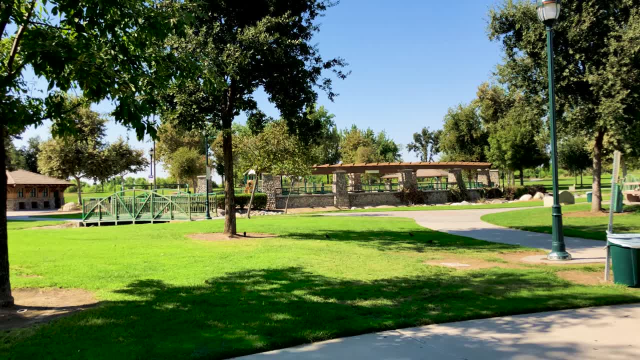 Bakersfield River Walk Park on a sunny summer day.