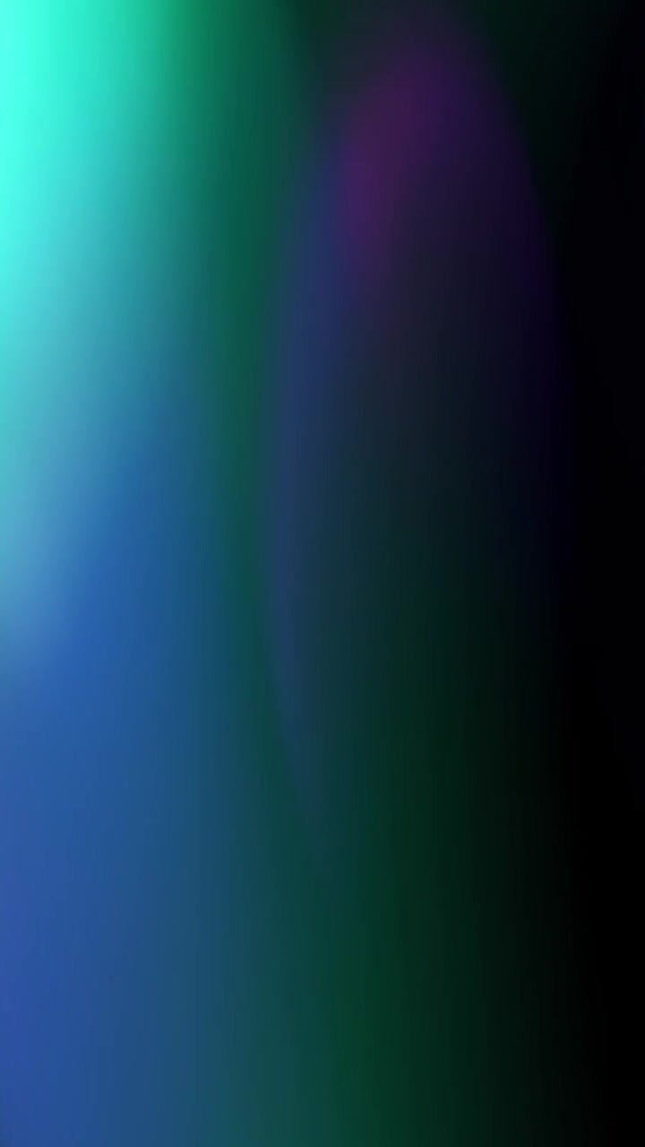 Abstract Light Leaks and Color Transitions on Dark Background