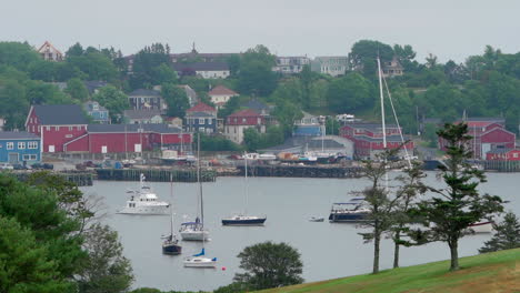 Small-colourful-community-town-in-Nova-Scotia,-Canada-on-an-overcast-day