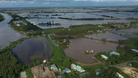 aerial view of colorful mekong delta afternoon over agricultural land and waterways in vietnam