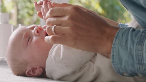 happy mother caring for baby at home loving mom nurturing toddler gently soothing her child enjoying motherhood