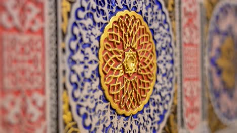spain's aranjuez royal palace: museum exhibition detail revealing intricate, historic islamic or mudéjar patterns; a close-up of exquisite decorative art craftsmanship.