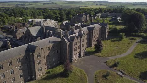 Aerial-view-of-Sunnyside-abandoned-hospital,-Montrose,-Angus,-Scotland