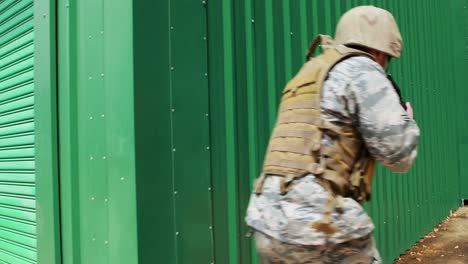 military soldier guarding with a rifle