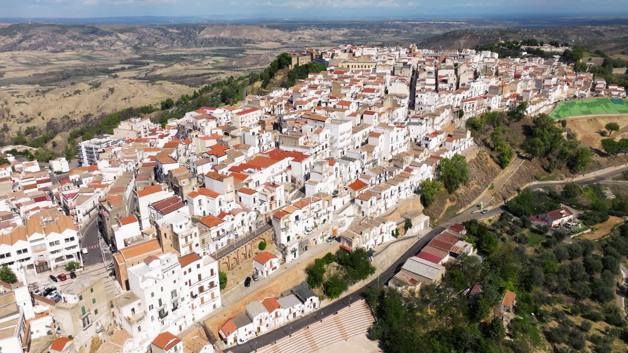 White Town Of Pisticci In Matera Province, Basilicata, Southern Italy. Aerial Drone Shot